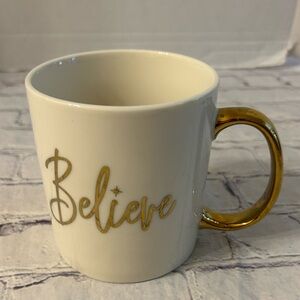 BELIEVE WHITE WITH GOLD HANDLE AND LETTERS COFFEE/COCOA/TEA MUG